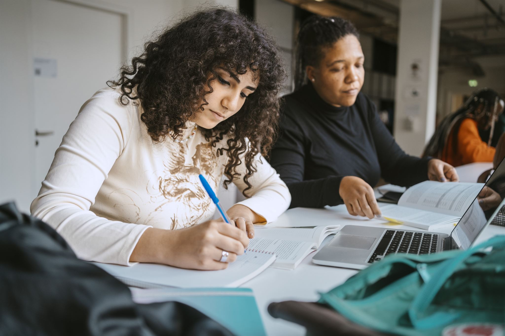 Adults-studying-at-table