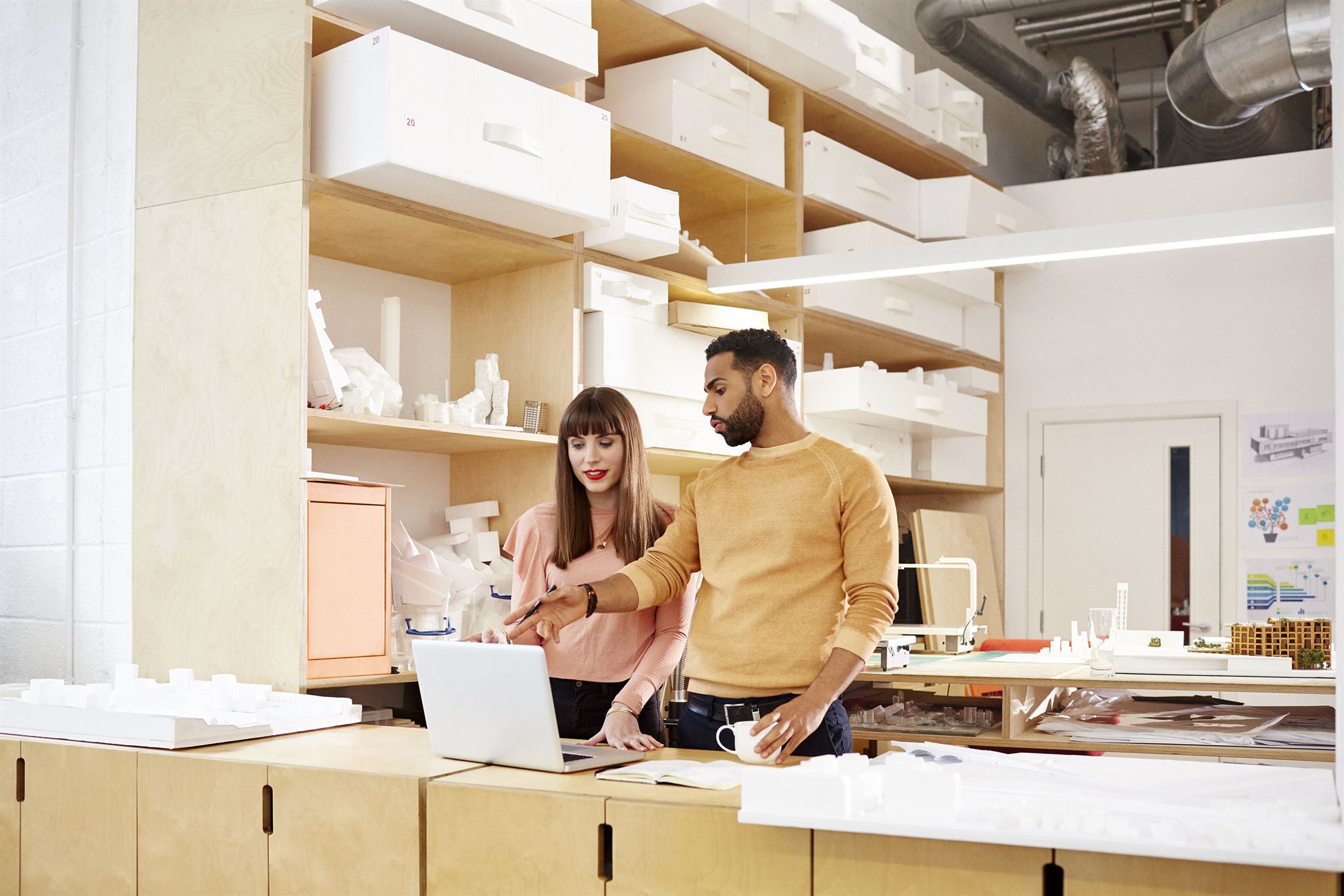 Couple-working-in-storage-room
