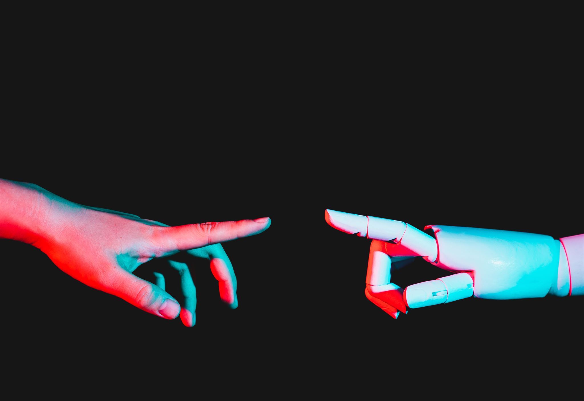 Human-hand-and-robot-hand-nearly-touching